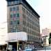(KMC.2011.1.34) - Majestic Building Abandoned, 301 W Main, View N on Harvey Across Main, c.1975
